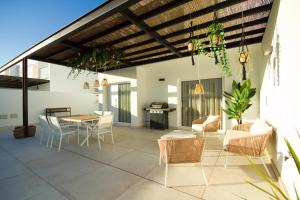 Et opholdsområde på Casa piña colada - By AZ Rentals