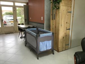 a room with a table and a table and a table at Super studio coup de cœur in Niort