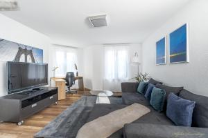 TV o dispositivi per l'intrattenimento presso Ferienwohnungen mit Gratis Parkplatz Eichen