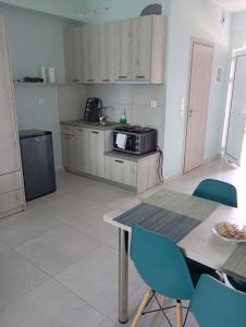 A kitchen or kitchenette at Lighthouse Apartments