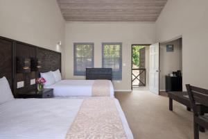 Letto o letti in una camera di Hawksbill Resort Antigua - All Inclusive