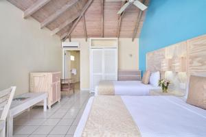 Letto o letti in una camera di Hawksbill Resort Antigua - All Inclusive