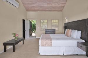 Letto o letti in una camera di Hawksbill Resort Antigua - All Inclusive
