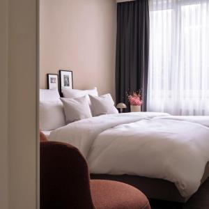Postel nebo postele na pokoji v ubytování STAYERY Cologne Sülz