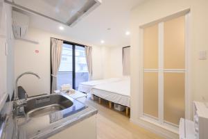 Koupelna v ubytování Oku Apartment + 28 fotografií