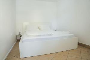 Postel nebo postele na pokoji v ubytování Apartma Papillon + 80 fotografií