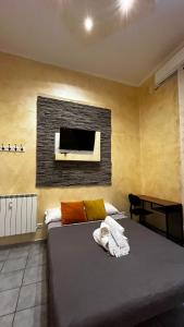A bed or beds in a room at Double B Ferruccio I