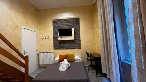 A bed or beds in a room at Double B Ferruccio I