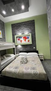 A bed or beds in a room at Double B Ferruccio I