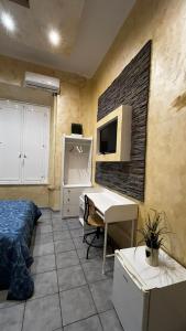 A television and/or entertainment centre at Double B Ferruccio I