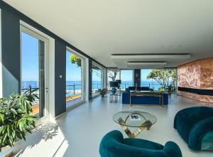 Гостиная зона в Cala del Porto Punta Ala - Preferred Hotels