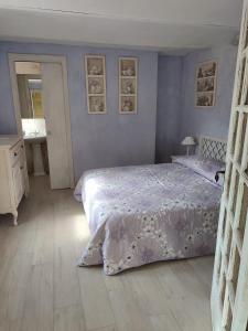 Ένα ή περισσότερα κρεβάτια σε δωμάτιο στο La Bastide de Claude