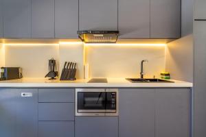 Køkken eller tekøkken på The R Apartments Pererenan