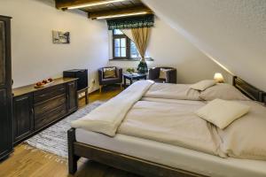 Postel nebo postele na pokoji v ubytování Stará Zvonica + 37 fotografií