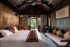 Postel nebo postele na pokoji v ubytování Nature Garden Ecolodge Ninh Bình