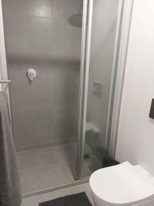 Ένα μπάνιο στο 305 Mossel Cove Sea View Deluxe