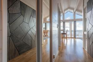 TV a/nebo společenská místnost v ubytování Lofoten Links Lodges