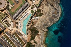 an aerial view of a resort on the beach at Six Senses Ibiza in Portinatx