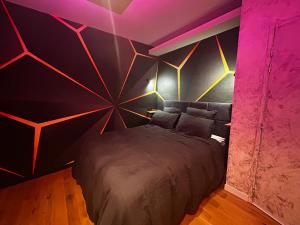 Una cama o camas en una habitación de L'instant