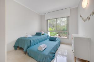 Katil atau katil-katil dalam bilik di Magnífico piso de 3 dormitorios en las Colinas +39 gambar