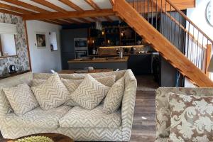Posezení v ubytování Converted Barn