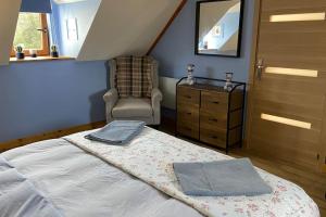 Postel nebo postele na pokoji v ubytování Converted Barn