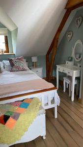 Postel nebo postele na pokoji v ubytování Converted Barn