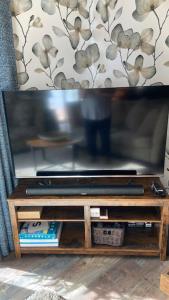 TV a/nebo společenská místnost v ubytování Converted Barn