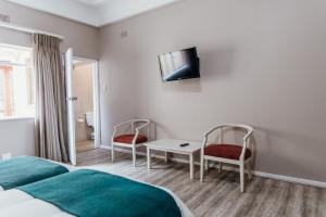 TV a/nebo společenská místnost v ubytování The Wilderness Hotel