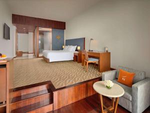 Postel nebo postele na pokoji v ubytování Novotel Nha Trang