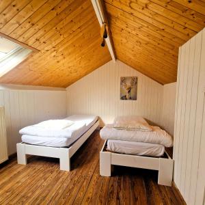 Postel nebo postele na pokoji v ubytování Woodstone