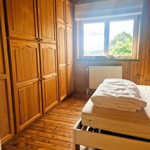 Postel nebo postele na pokoji v ubytování Woodstone