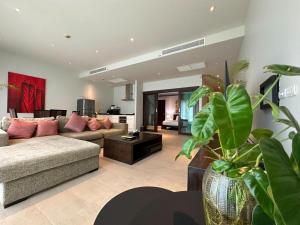 Et opholdsområde på Olive 1 Bedroom Beachfront + 34 billeder