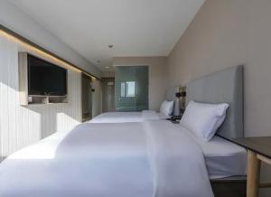 Foto dalla galleria di Lai Yi Hotel Changji Road Anting Subway Station Branch a Jiading