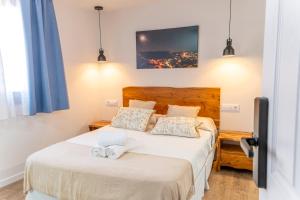 Hotel Rural La Bodega del Baldomero客房内的一张或多张床位