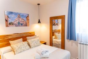 Hotel Rural La Bodega del Baldomero客房内的一张或多张床位