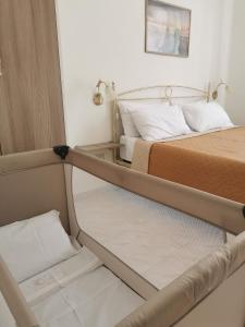 Кровать или кровати в номере Reginella House Amalfi Coast +55 фотографий