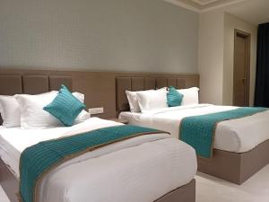 Hotel shree ji inn客房内的一张或多张床位