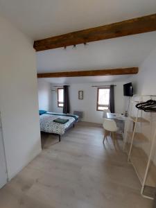 Ένα ή περισσότερα κρεβάτια σε δωμάτιο στο Studio cosy au coeur du centre ville