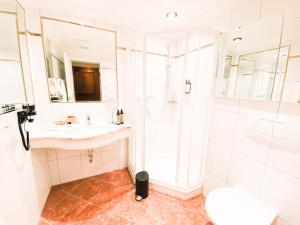 Kúpeľňa v ubytovaní Hotel Steiner Superior