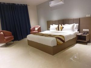Hotel shree ji inn客房内的一张或多张床位