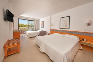 Postel nebo postele na pokoji v ubytování Hotel Casablanca