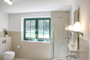 Koupelna v ubytování Ferienhaus Drewitz (EOC-FUP 07/2017) + 8 fotografií