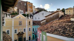 a view of roofs of buildings in a city at Pousada Suítes Do Pelô in Salvador