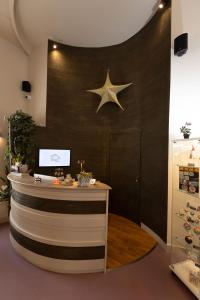 a counter with a star on the wall at Lungomare Suite & Spa in Naples