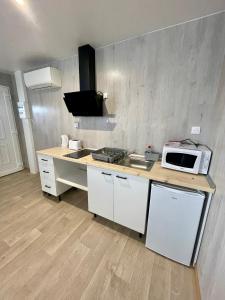 Kuchyň nebo kuchyňský kout v ubytování Appartement - location saisonnière