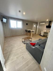 Posezení v ubytování Appartement - location saisonnière