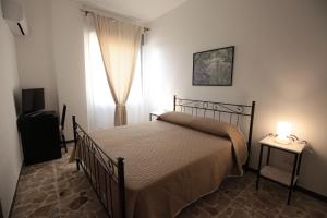 Voodi või voodid majutusasutuse B&B Tarì toas