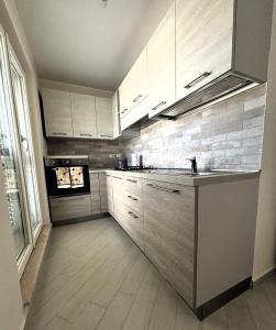 Kuchyň nebo kuchyňský kout v ubytování La terrazza di Sferra