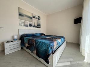 Postel nebo postele na pokoji v ubytování La terrazza di Sferra